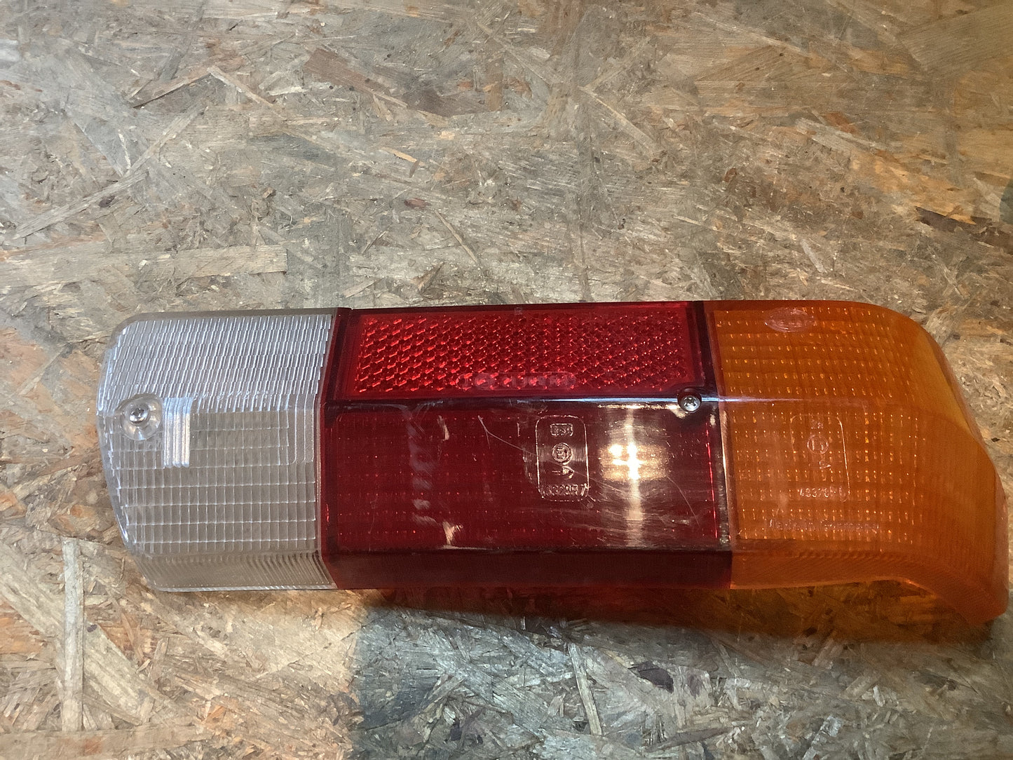 Audi 60, F103 Rückleuchte hinten links Original Hella NEU