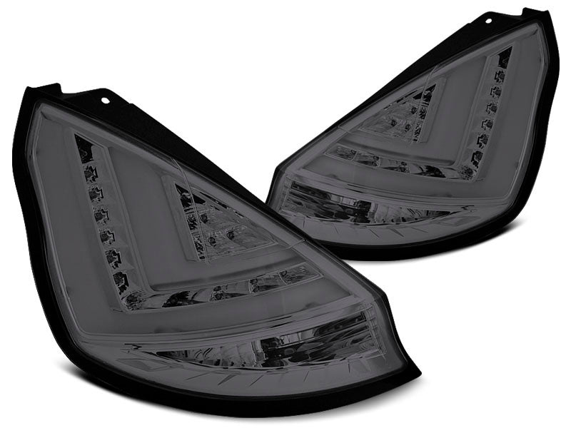 Tuning-Tec LED Lightbar Rückleuchten für Ford Fiesta MK7 12-16 rauch mit LED Blinker
