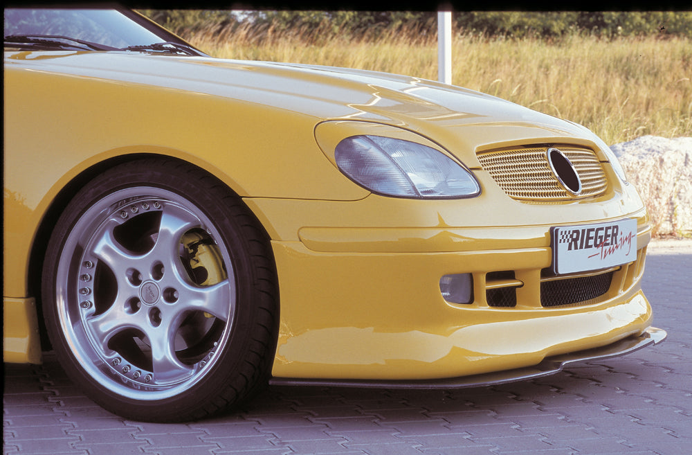 Mercedes SLK (R170) Rieger Spoilerschwert GFK mit Kohlefaserauflage für Spoilerlippe 70002 und Spoileransatz 70001 gekantete Version, für Spoilerlippe, für Spoileransatz, GFK, Carbon,
inkl. Montagezubehör