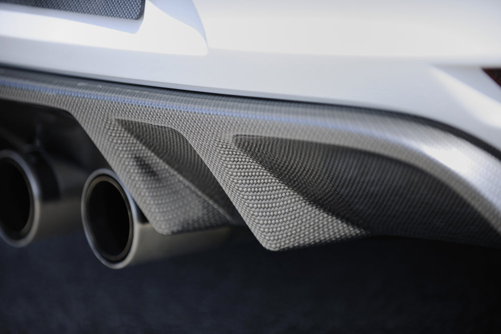 VW Golf 6 Rieger Heckeinsatz mit 2 Doppelfinnen für Doppelendrohr mittig, ABS, Carbon-Look,
inkl. Montagezubehör, Gutachten