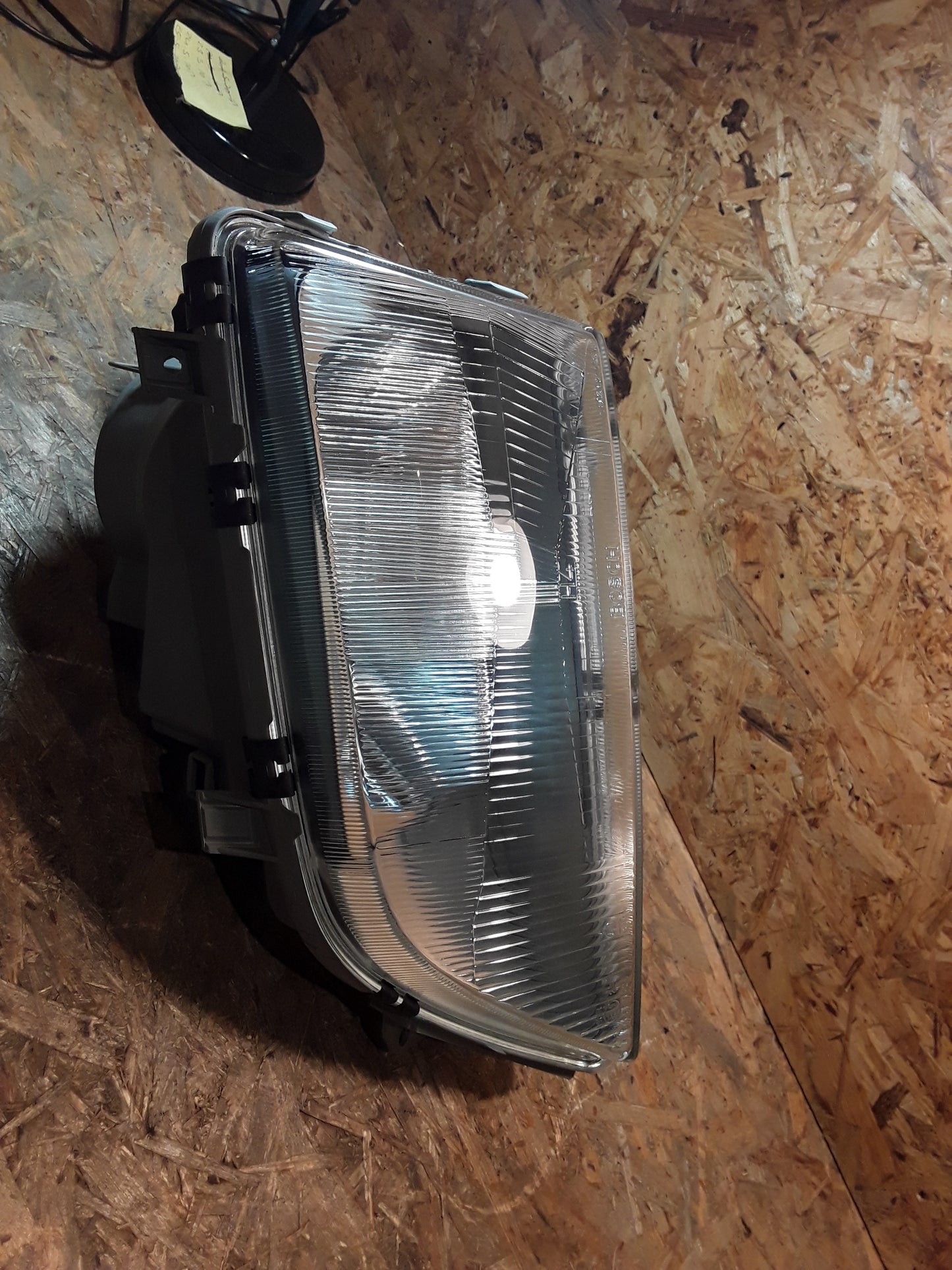 Omega A Scheinwerfer vorne links original GM Opel NEU