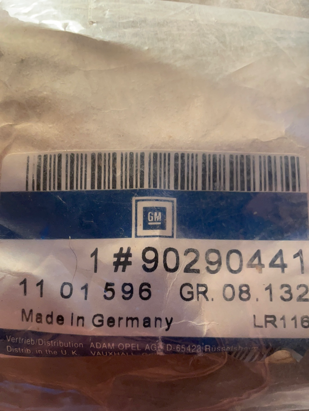 Original GM Opel Omega A Schutzzierleiste dunkelbeige an Kotflügel vorne links Neu