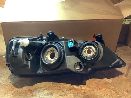 Opel Astra G H7 Halogen Scheinwerfer links Original Hella GM NEU