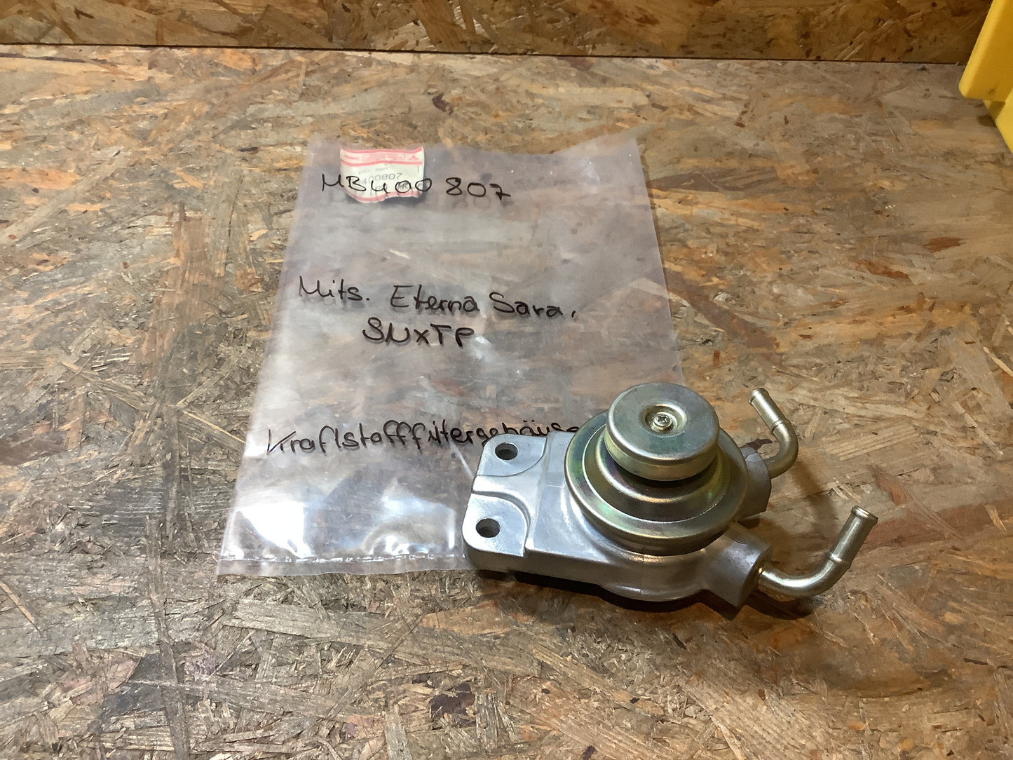 Mitsubishi Externa Sara, SNXTP Kraftstofffiltergehäuse Original Mitsubishi NEU