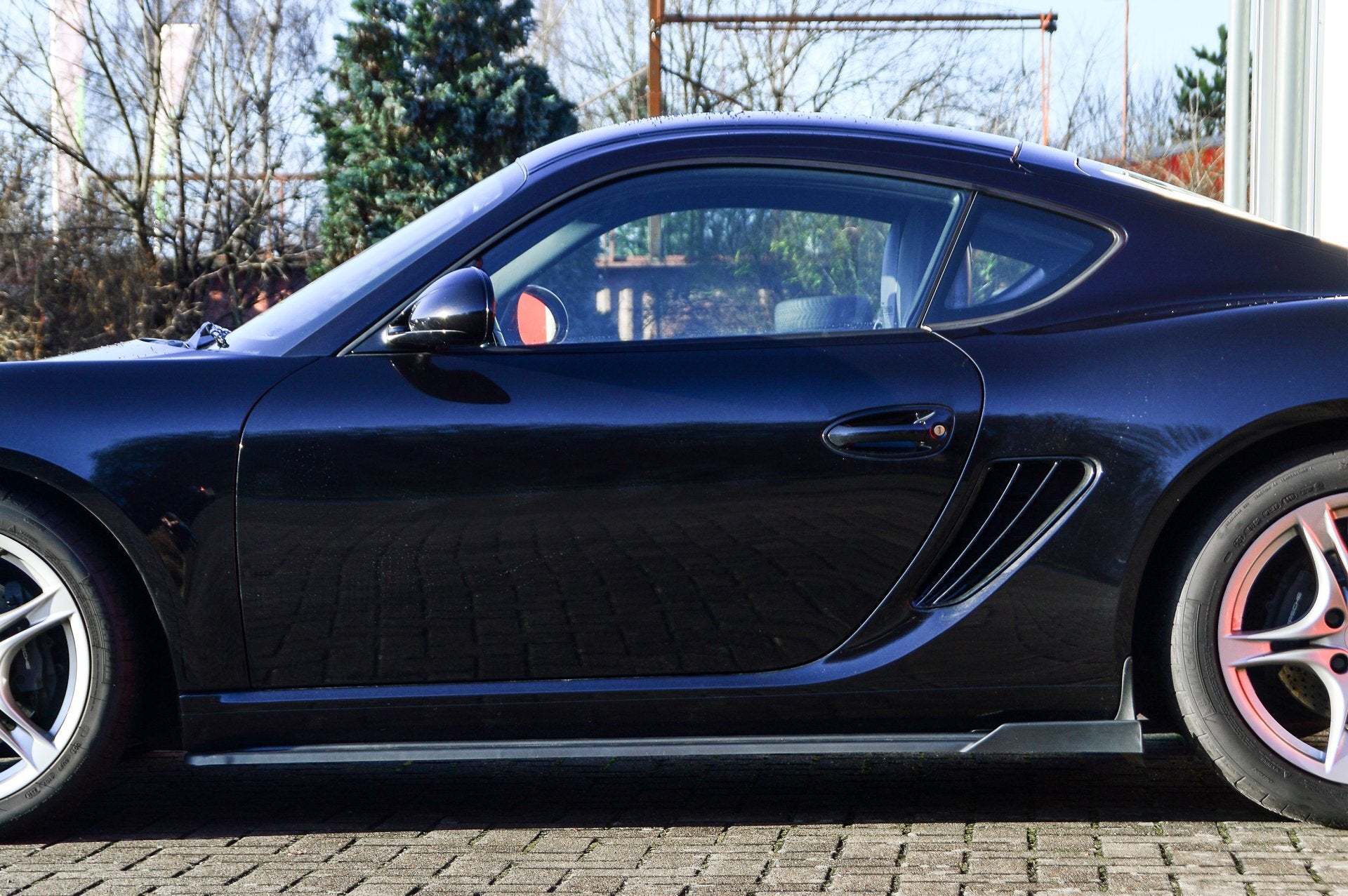 CUP Seitenschwellersatz mit Wing hinten Porsche Cayman 987 Bj.: 2005-2009 Carbon