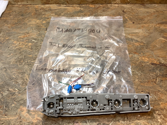 Ford Escort Tournier 7, VII; Lampenträger H.R, mit Stecker Original Ford NEU