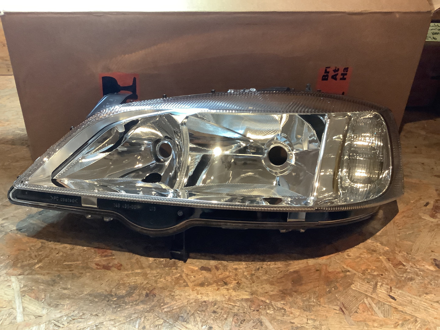 Opel Astra G H7 Halogen Scheinwerfer links Original Hella GM NEU