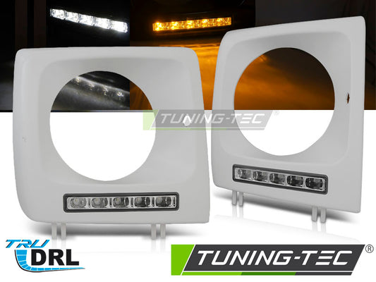 Tuning-Tec LED Tagfahrlicht Scheinwerferrahmen für Mercedes Benz G-Klasse W463/W461 01-12 unlackiert