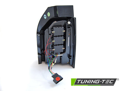 Tuning-Tec Voll LED Lightbar Rückleuchten für VW T6 15-19 schwarz/klar mit dynamischen Blinker (für Heckklappe)