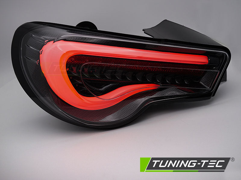 Tuning-Tec LED Lightbar Rückleuchten für Toyota GT86 12-21 schwarz/carbon mit dyn. Blinker