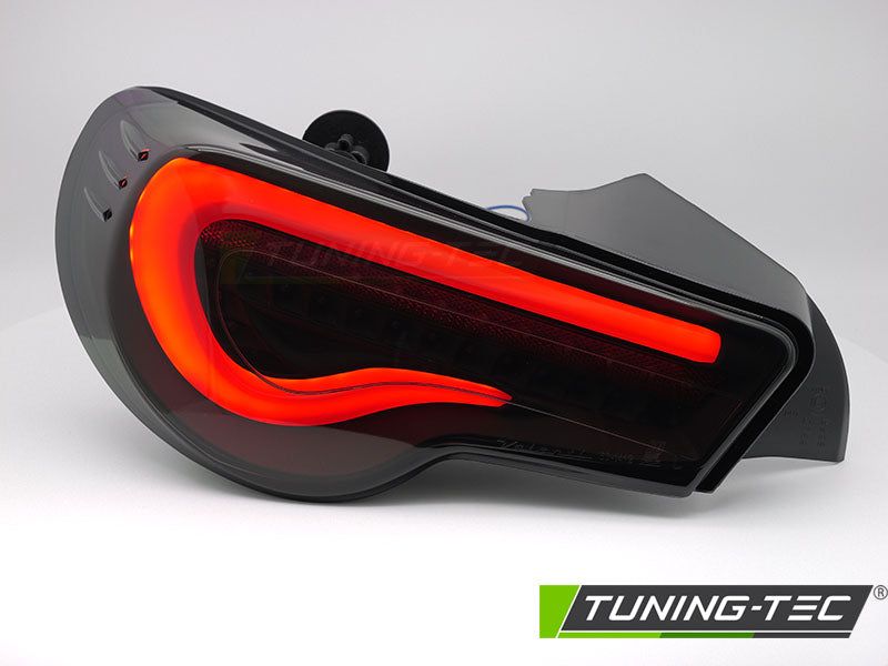 Tuning-Tec LED Lightbar Rückleuchten für Toyota GT86 12-21 schwarz/rauch mit dyn. Blinker