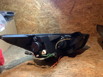 Tuning-Tec LED Tagfahrlicht Scheinwerfer für Hyundai Tucson / IX35 10-13 schwarz