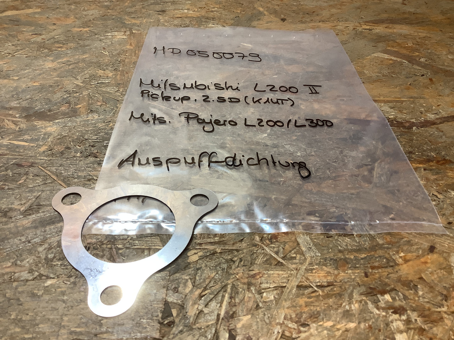 Mitsubishi L200 II, Pick-up 2.5D (K14T) Auspuffdichtung Original Mitsubishi NEU