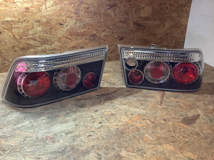 Tuning-Tec LED Angel Eyes Scheinwerfer für Opel Calibra 90-97 schwarz