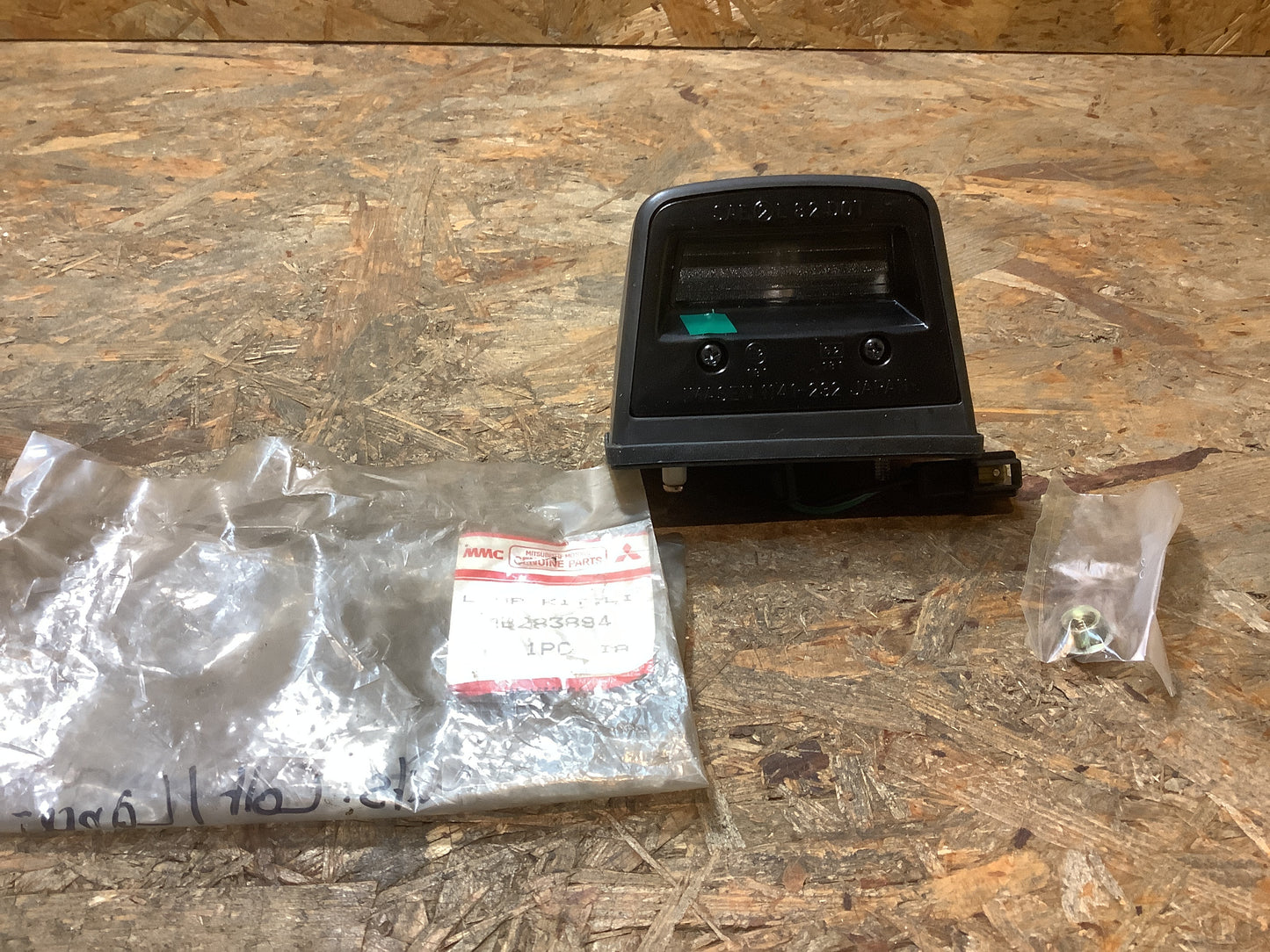 Mitsubishi Colt Lancer Kennzeichenleuchte rechts Original NEU