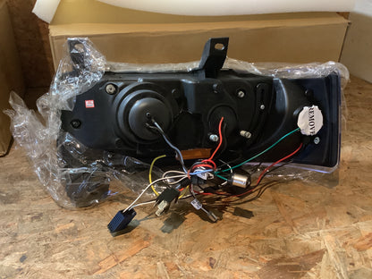 Tuning-Tec LED Tagfahrlicht Scheinwerfer für VW T4 90-03 (kurzer Vorderwagen) schwarz mit LED Blinker