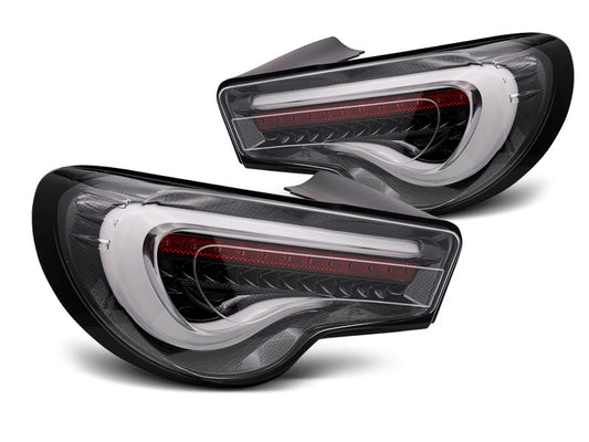 Tuning-Tec LED Lightbar Rückleuchten für Toyota GT86 12-21 schwarz/carbon mit dyn. Blinker