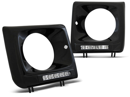 Tuning-Tec LED Tagfahrlicht Scheinwerferrahmen für Mercedes Benz G-Klasse W463/W461 01-12 schwarz (hochglanz)