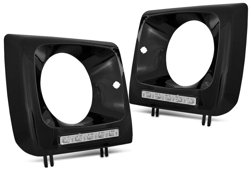 Tuning-Tec LED Tagfahrlicht Scheinwerferrahmen für Mercedes Benz G-Klasse W463/W461 01-12 schwarz (hochglanz)