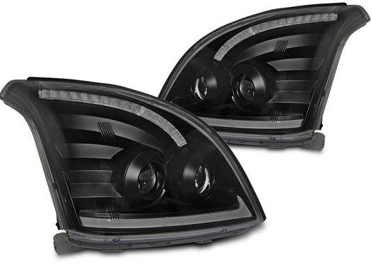 Tuning-Tec LED Tagfahrlicht Scheinwerfer für Toyota Land Cruiser 120 03-09 schwarz mit dynamischem LED Blinker