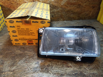 VW Jetta 02/84-... Hauptscheinwerfer links original Hella NEU