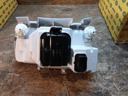 VW Polo lll 10/94-... Hauptscheinwerfer original Hella NEU