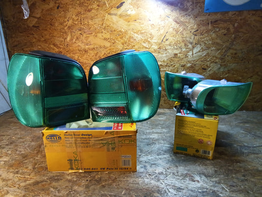 VW Polo lll 10/94-... Rückleuchtensatz mit Blinkerleuchten grün original Hella NEU