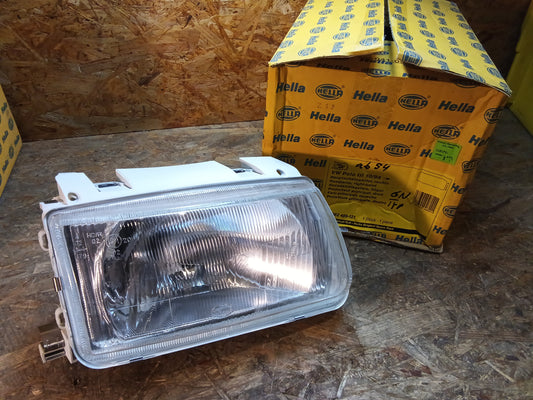 VW Polo lll 10/94-... Hauptscheinwerfer original Hella NEU