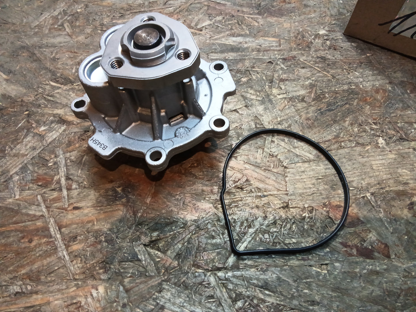 Opel Astra G,H,J Corsa D E Meriva A Mokka Wasserpumpe original GM NEU