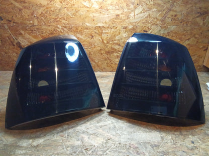 Tuning-Tec Rückleuchten für Opel Astra G 97-04 schwarz/rauch (LTOP48)