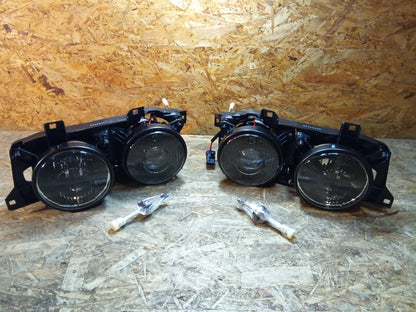 Tuning-Tec Scheinwerfer für BMW 5er E34 /7er E32 86-95 schwarz mit Fadenkreuz
