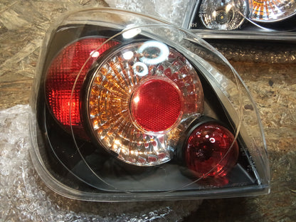 Tuning-Tec Rückleuchten für Ford Fiesta MK4/MK5 95-02 schwarz (LTFO27)