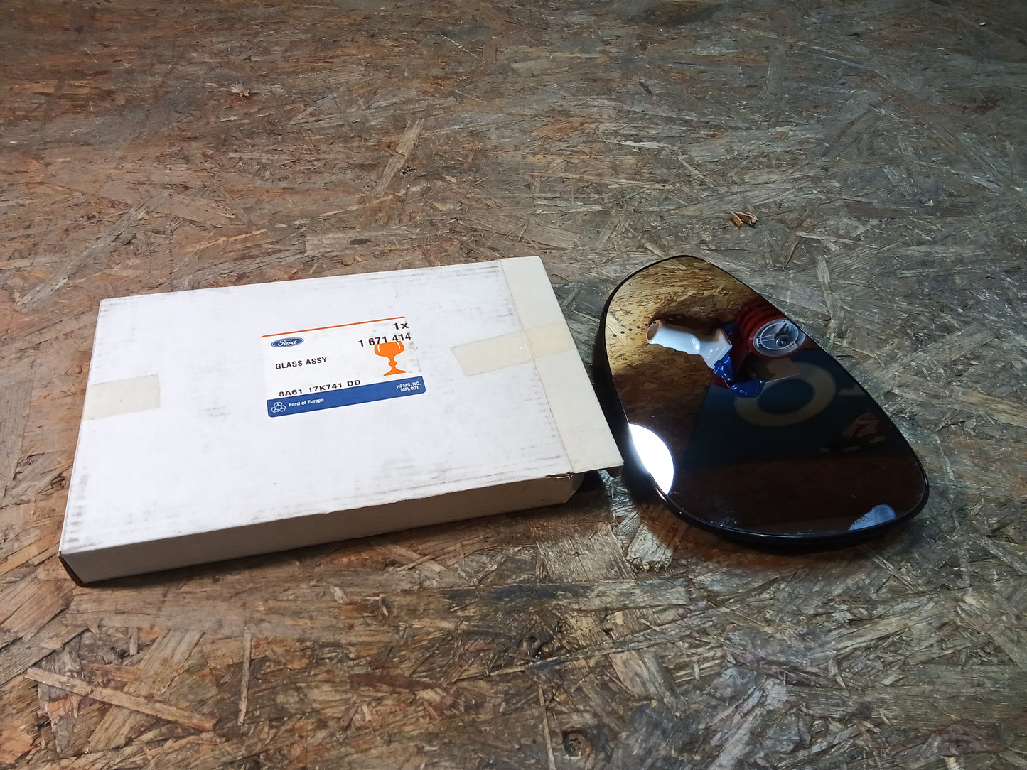 Ford Fiesta MK7 Spiegelglas links original Ford NEU