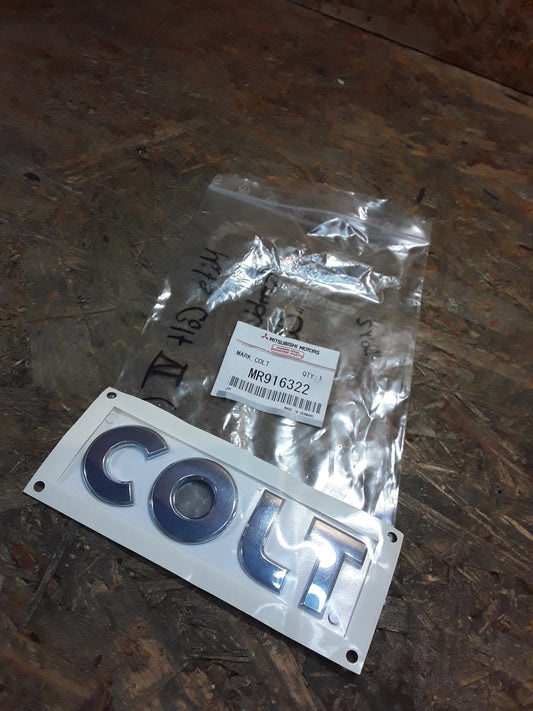Mitsubishi Colt VI (-9/08) Emblem "COLT" original Mitsubishi NEU