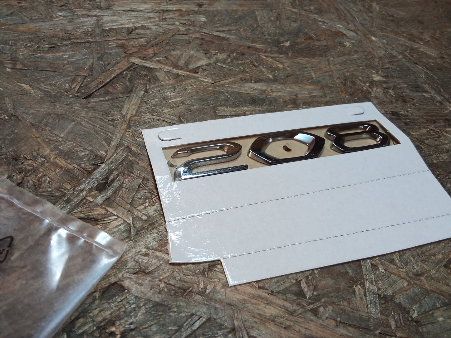 Peugeot 208 E,blem Heckklappe original PSA NEU