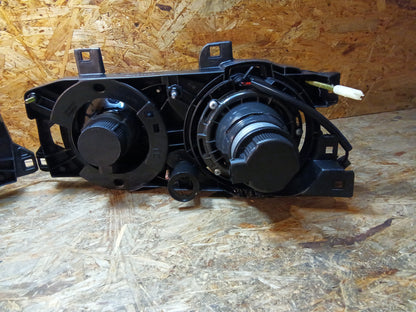 Tuning-Tec Scheinwerfer für BMW 5er E34 /7er E32 86-95 schwarz mit Fadenkreuz