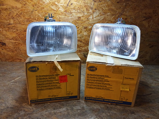 Ford Fiesta Hauptscheinwerferset H4 original Hella NEU NOS