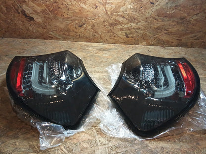 Tuning-Tec LED Rückleuchten für BMW 1er E87/E81 LCI 07-11 rauch (LDBM89)