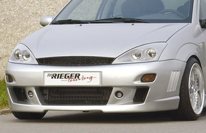 Ford Focus 1 Rieger Spoilerstoßstange -> bis Modell 10/2001 mit Aussparung für Blinkleuchten, mit seitlichen Rippen, ABS, 
inkl. Alugitter, Montagezubehör, ABE