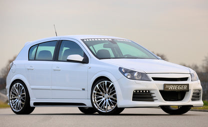 Opel Astra H Rieger Spoilerstoßstange mit kleiner Aussparung für SWRA mit Aussparung für Tagfahrleuchten, ABS, für Fzg. mit Scheinwerferreinigungsanlage, OPC und ohne OPC, 
inkl. Montagezubehör, Alugitter, Lüftungsschacht, Lufteinlassblende, ABE