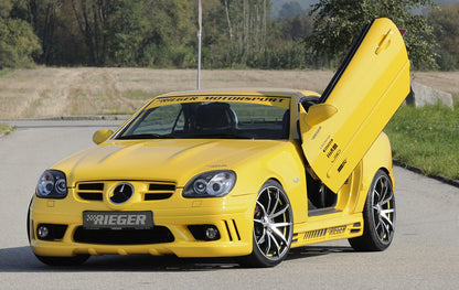 Mercedes SLK (R170) Rieger Spoilerstoßstange (orig. NSW passen nicht mehr) mit seitlichen Rippen, offen, ABS, für Fzg. mit Scheinwerferreinigungsanlage, NSW, 
inkl. Alugitter, Montagezubehör, ABE