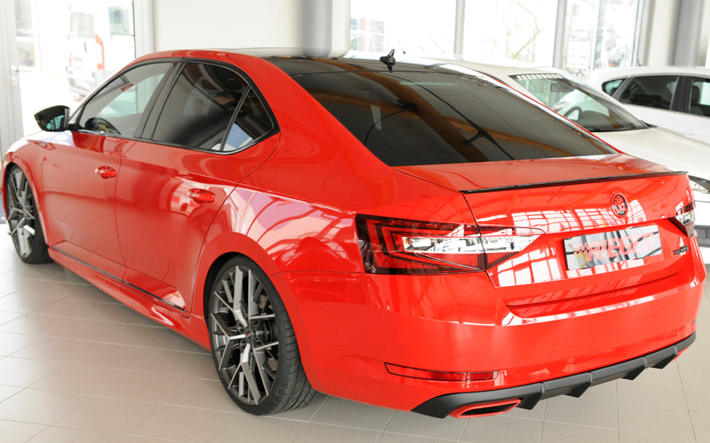 Skoda Superb III (3T/3V) Rieger Heckeinsatz nur 2.0 TSI (200/206kW) für orig. Endrohrblende li. u. re., ABS, für Fzg. mit Einparkhilfe (PDC), 
inkl. Montagezubehör, Gutachten