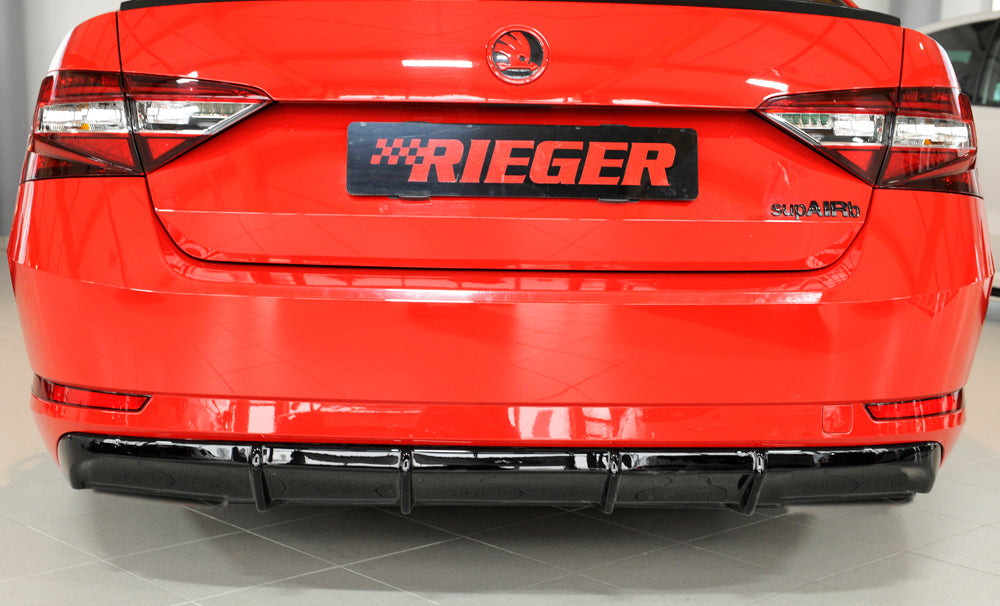 Skoda Superb III (3T/3V) Rieger Heckeinsatz ohne Aussparung für Endrohrblenden ABS, schwarz glänzend, für Fzg. mit Einparkhilfe (PDC), 
inkl. Montagezubehör, Gutachten