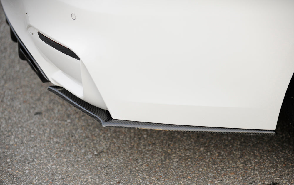 BMW 3er F80 M3 (M3) Carbon Heckschürzenansatz links BMW M4 F82/83 u. M3 F80, für orig. Heckschürze links, für orig. Heckschürze, Carbon, 
inkl. Montagezubehör, Gutachten