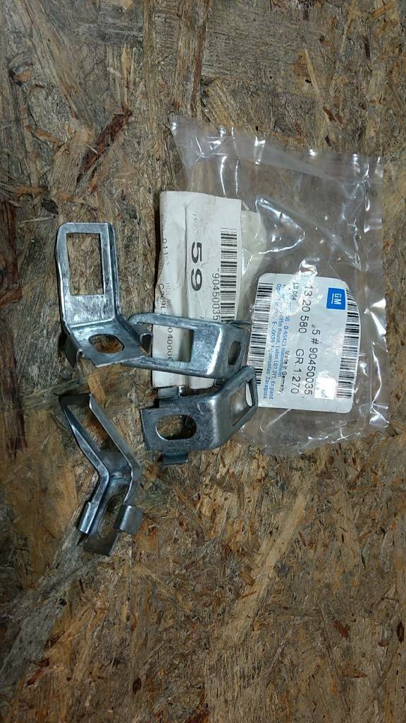 Original GM Opel Astra F Satz Halter links Kühlergitter NEU