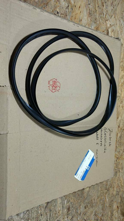 Original GM Opel Kadett E Caravan Zierleiste Glasscheibe NEU