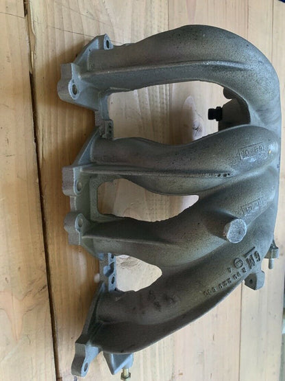 Original GM Opel Calibra Omega A 2.0L Saugrohr NEU