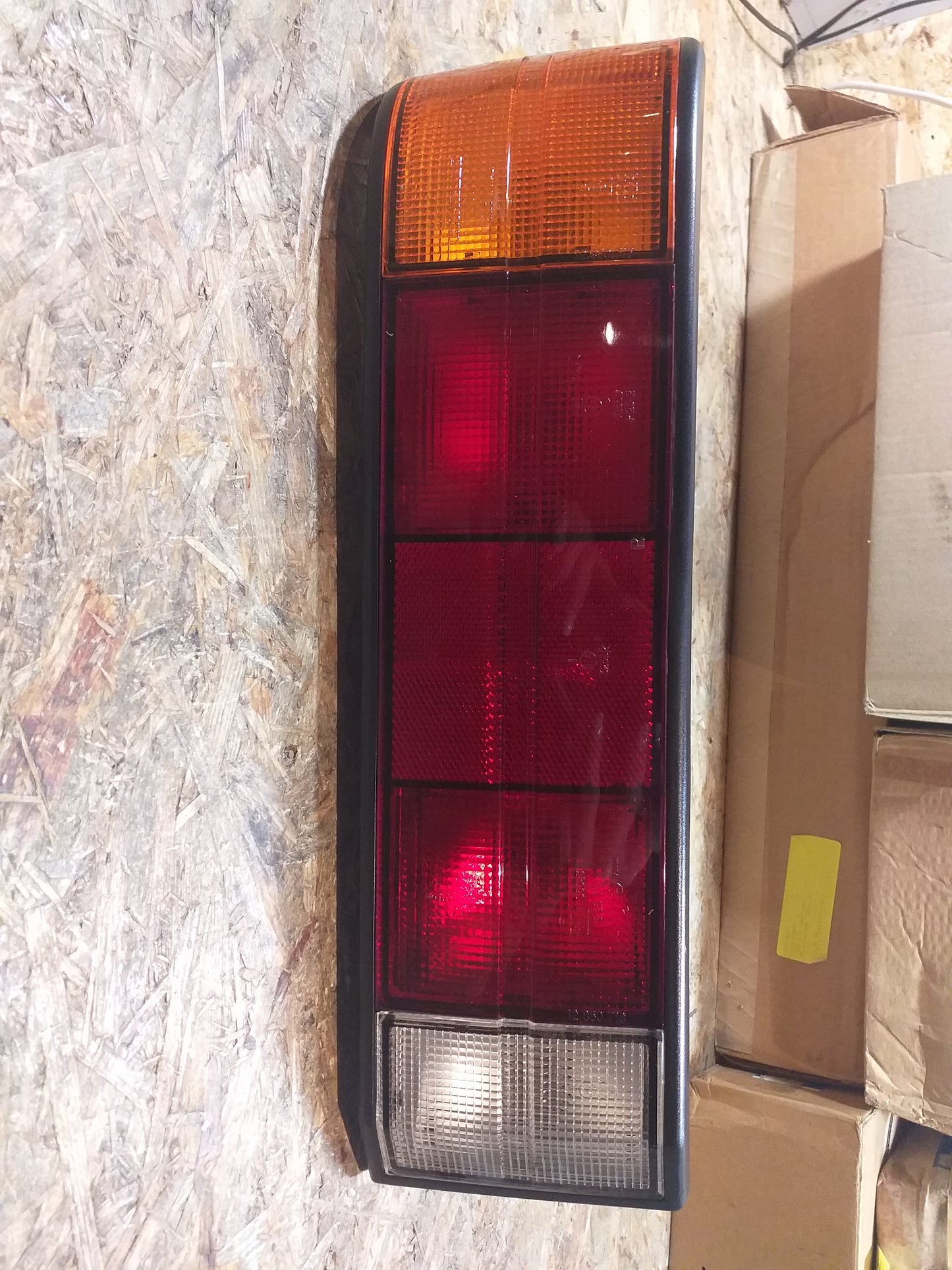 Rekord E Rücklicht rechts original GM Hella NEU