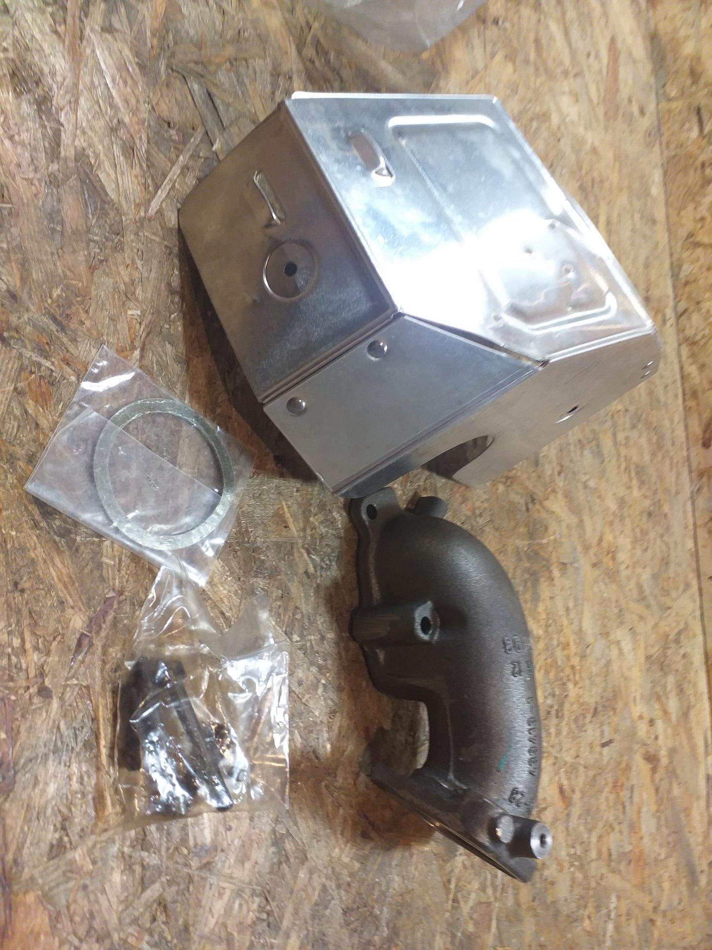 Astra F 1.7TD Krümmer Turbolader mit Wärmeschutzschild original GM Opel NEU