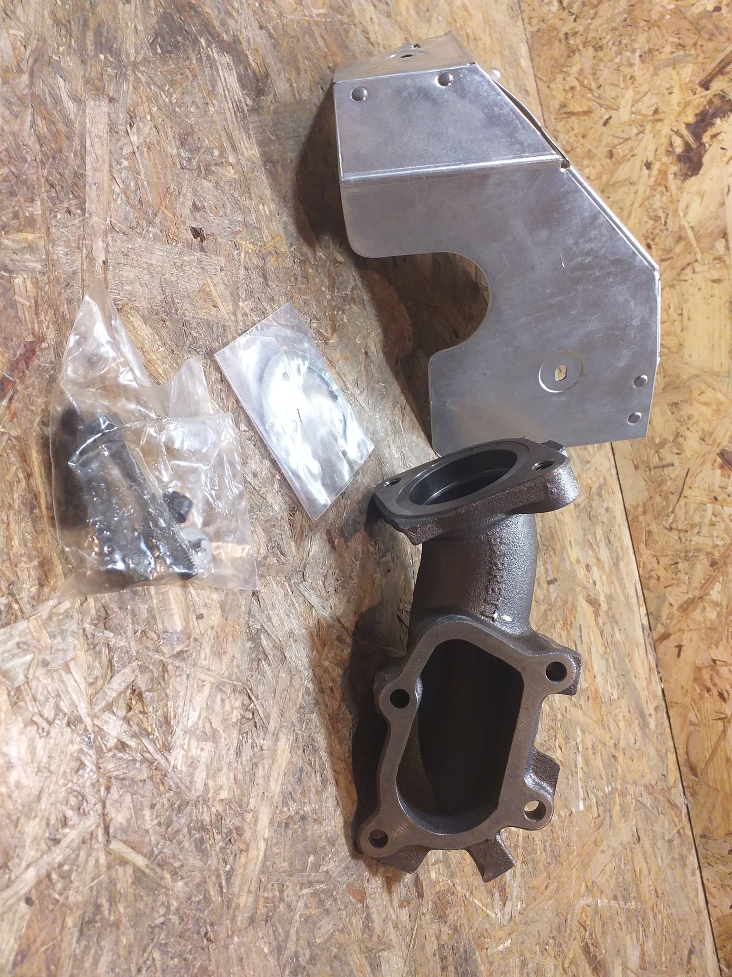 Astra F 1.7TD Krümmer Turbolader mit Wärmeschutzschild original GM Opel NEU